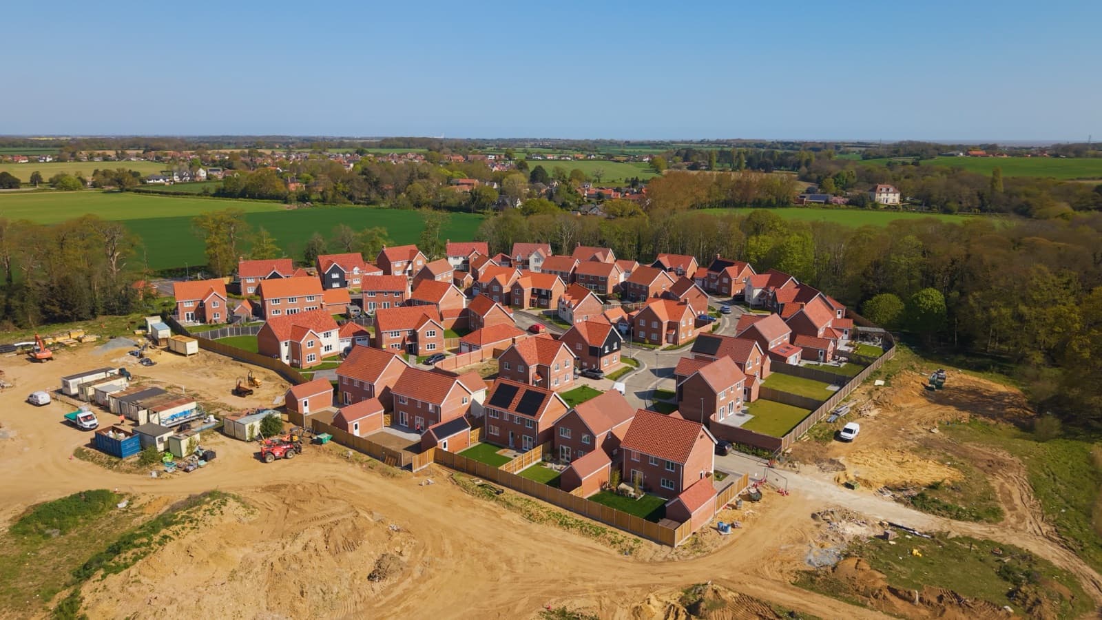 Aerial view of a completed new-build housing development — new homes solicitors in Norfolk and Suffolk