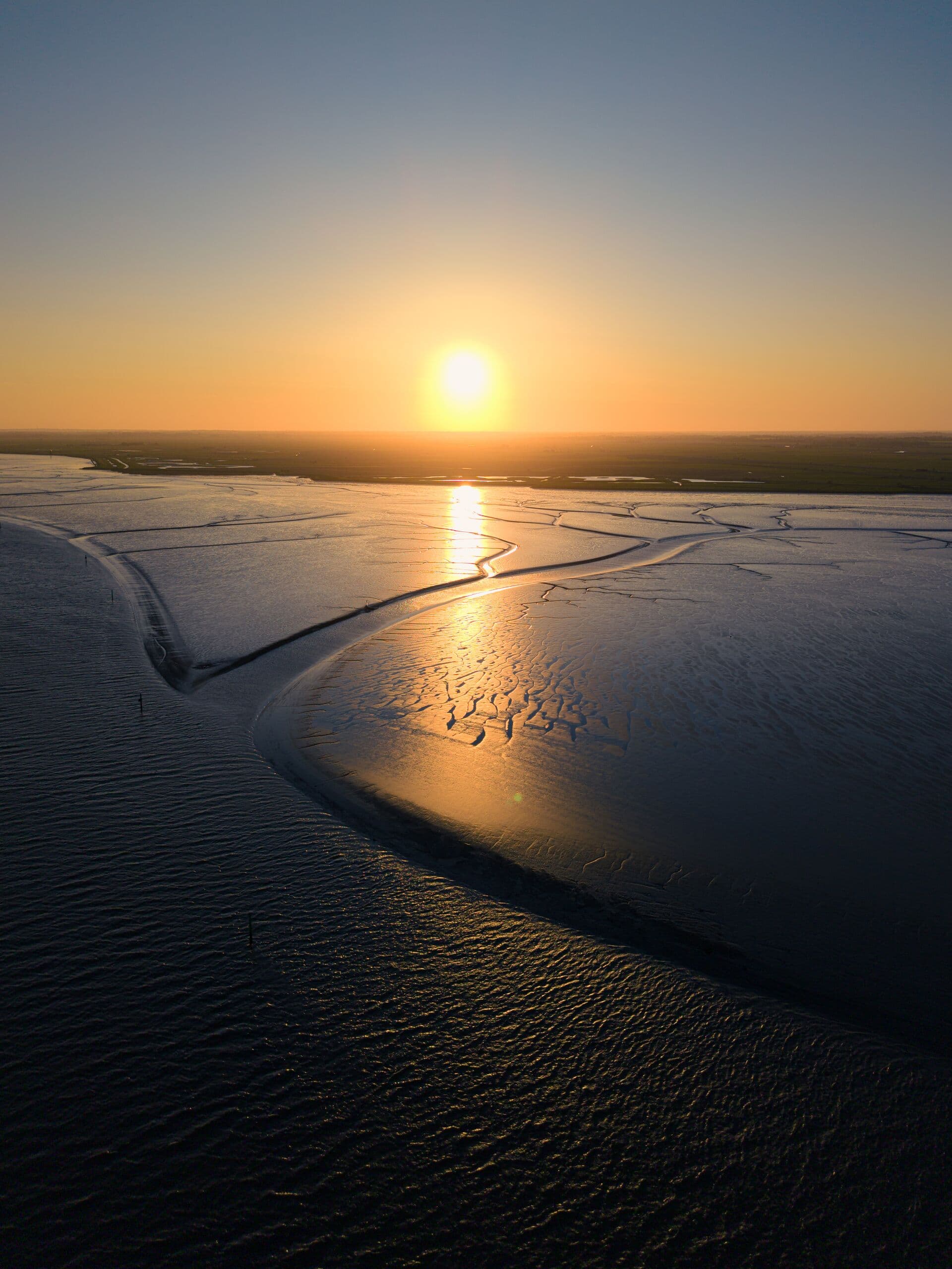 The sun setting over Breydon Water — pension sharing on divorce solicitors in Lowestoft and Norwich