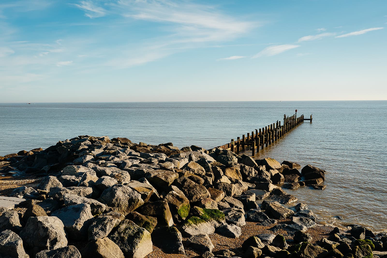 Rock breakwater reaching into the sea at Lowestoft — contentious probate solicitors in Norfolk and Suffolk
