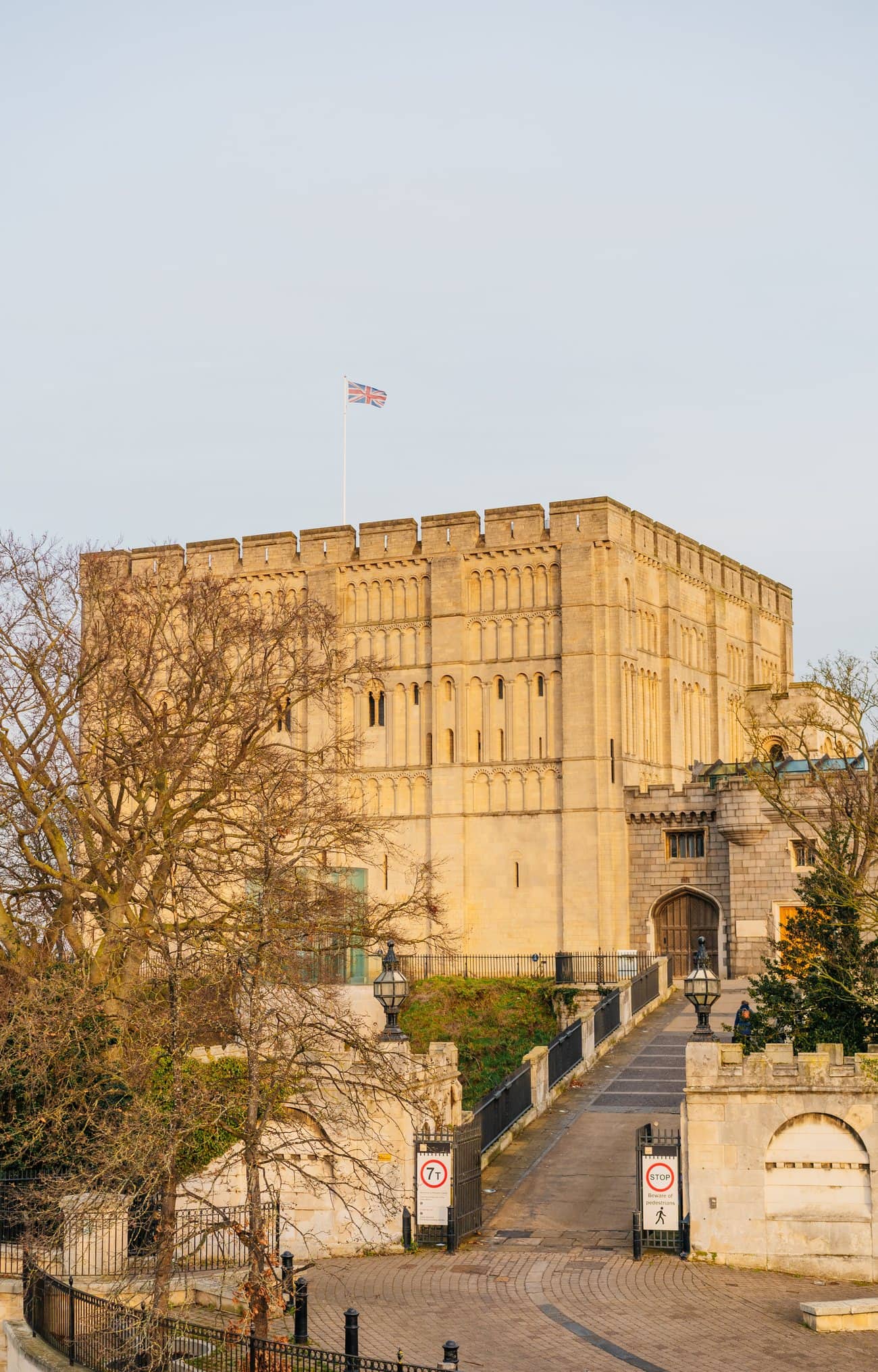 Norwich Castle keep in early morning light, above the path up the mound